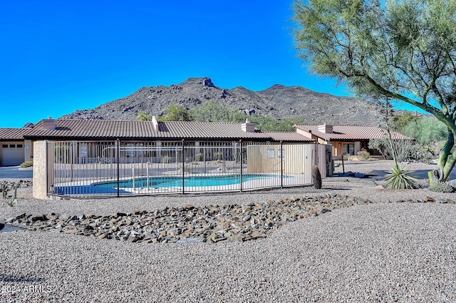 exterior space featuring a mountain view