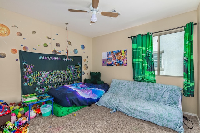 carpeted bedroom featuring ceiling fan