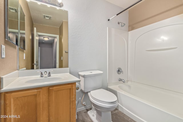 full bathroom with  shower combination, toilet, tile flooring, and vanity