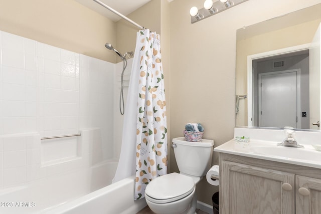 full bathroom featuring vanity, toilet, and shower / bath combo with shower curtain