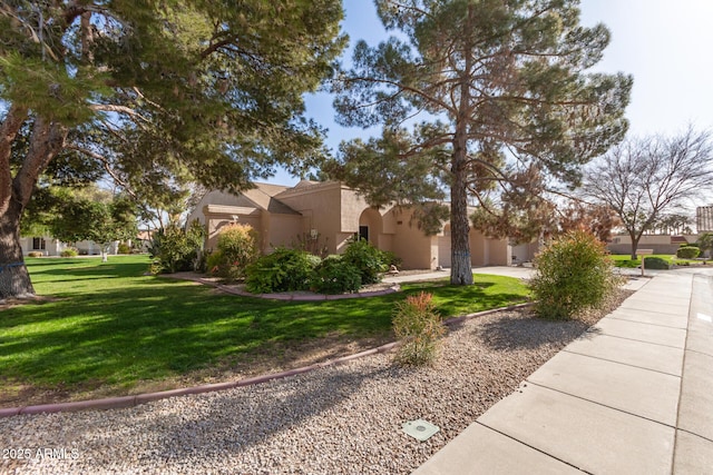 view of side of home with a yard