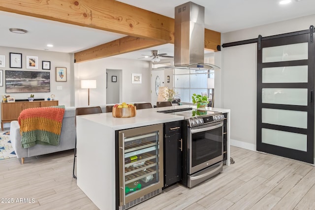 1702 W Glenrosa Ave, Phoenix, AZ 85015 - kitchen with island range hood, electric range, beverage cooler, light wood finished floors, and beamed ceiling