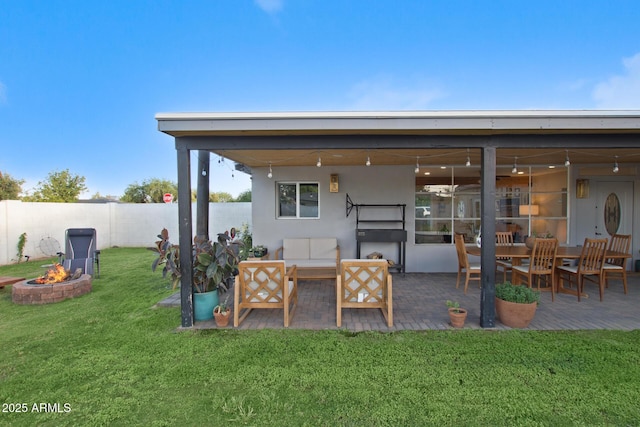 1702 W Glenrosa Ave, Phoenix, AZ 85015 - view of patio featuring an outdoor living space with a fire pit