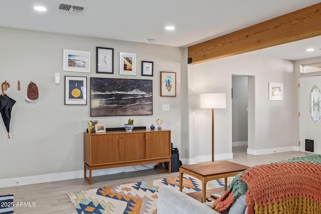 1702 W Glenrosa Ave, Phoenix, AZ 85015 - living room featuring light wood-style floors, recessed lighting, and baseboards