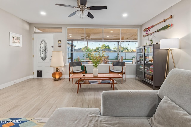 1702 W Glenrosa Ave, Phoenix, AZ 85015 - living room with ceiling fan, baseboards, wood finished floors, and recessed lighting