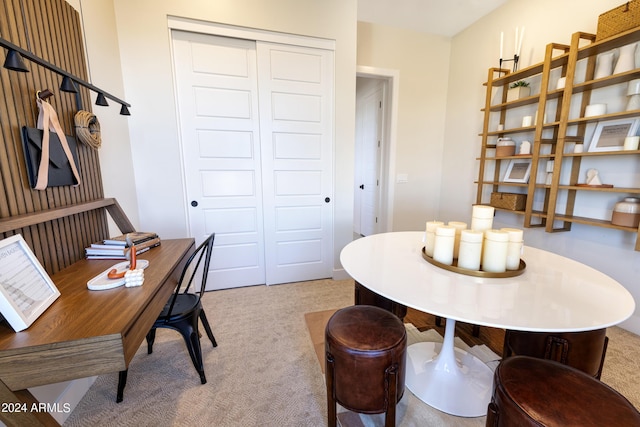 home office with light colored carpet