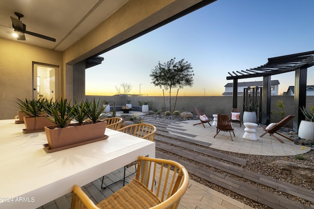 patio terrace at dusk with ceiling fan