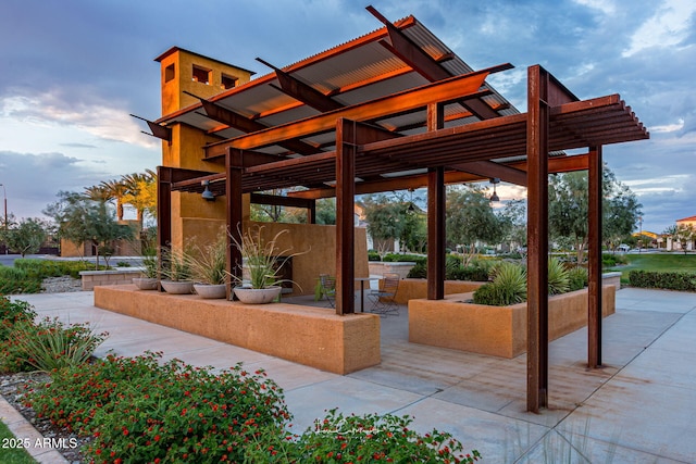 view of patio featuring a pergola