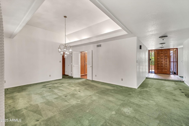 7037 N 11th Dr, Phoenix, AZ 85021 - empty room featuring a chandelier, carpet, and baseboards
