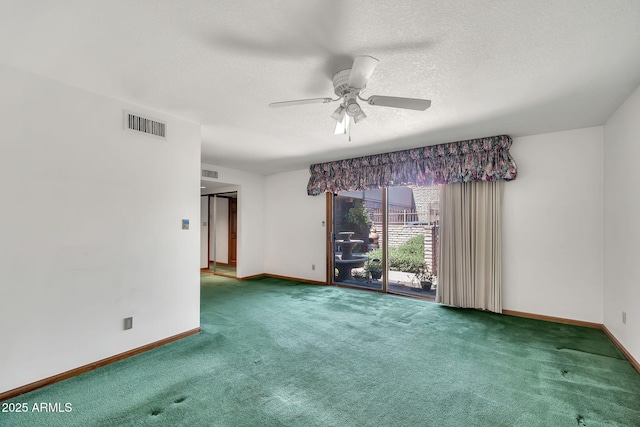7037 N 11th Dr, Phoenix, AZ 85021 - carpeted spare room with baseboards, a ceiling fan, and a textured ceiling