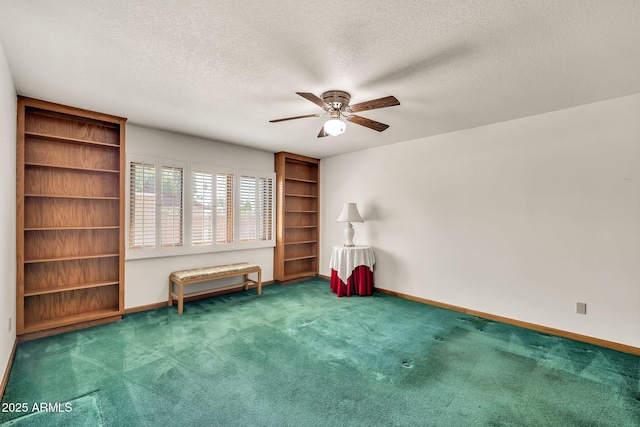 7037 N 11th Dr, Phoenix, AZ 85021 - spare room with ceiling fan, carpet floors, a textured ceiling, and baseboards