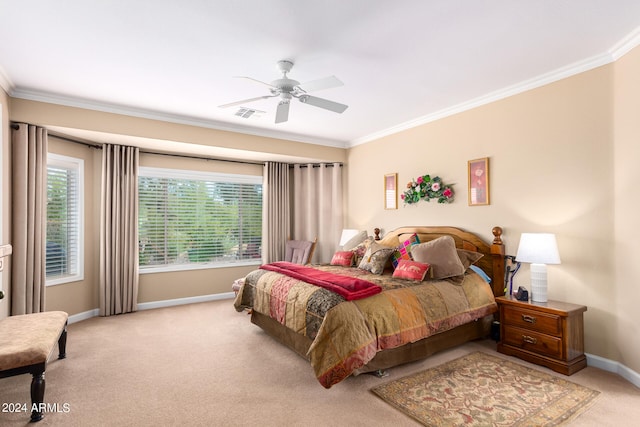 bedroom with ornamental molding, light carpet, and ceiling fan