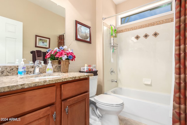 full bathroom with vanity, toilet, and shower / bath combo with shower curtain