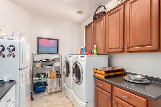 laundry room with washer and dryer