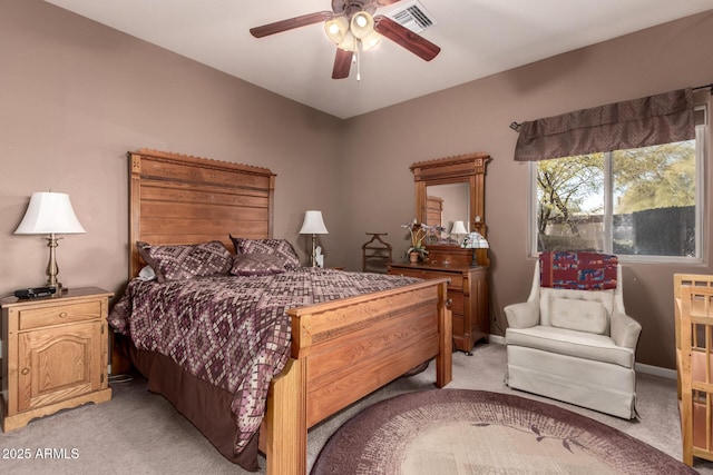 bedroom with light carpet and ceiling fan