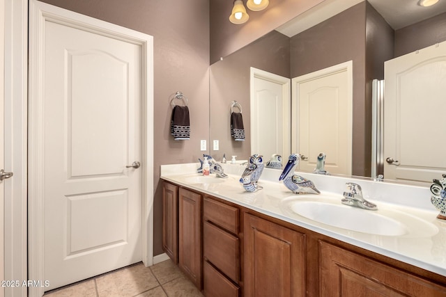 bathroom featuring vanity and tile patterned flooring