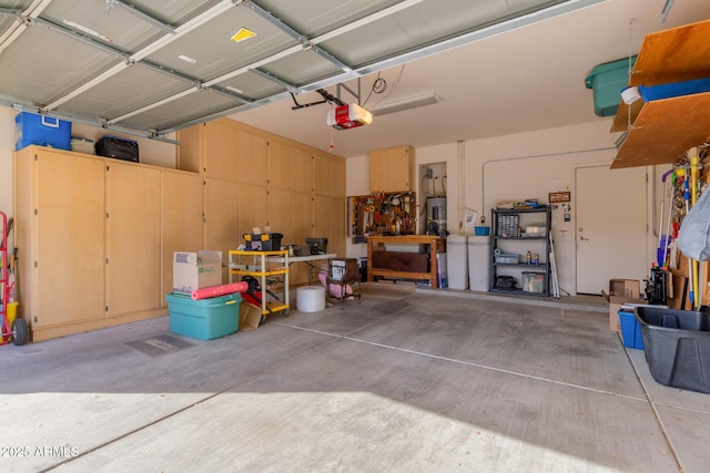 garage featuring a garage door opener