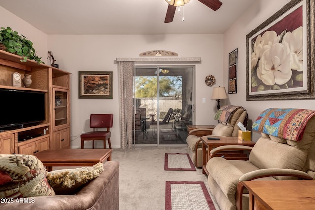 living room featuring ceiling fan and light carpet