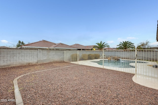 view of yard with a patio area, a fenced in pool, and a fenced backyard