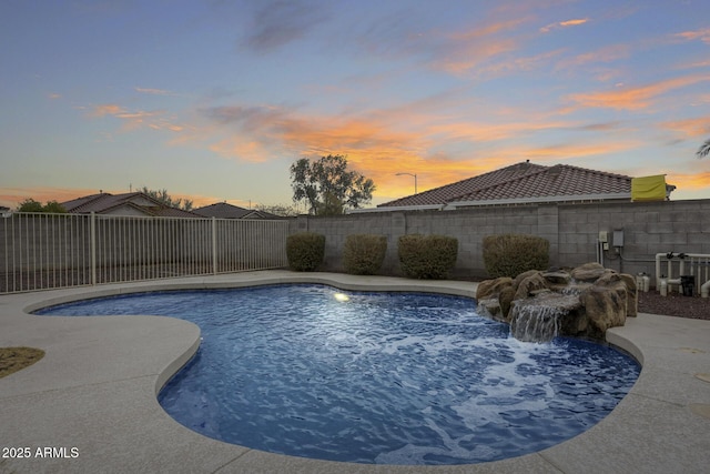 view of swimming pool with a fenced in pool and a fenced backyard