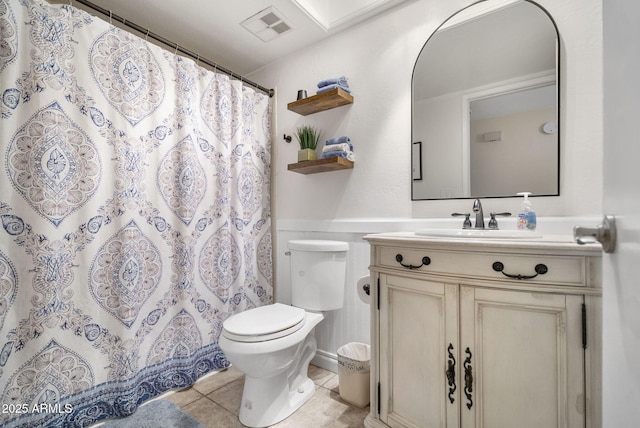 full bath with tile patterned flooring, visible vents, curtained shower, toilet, and vanity