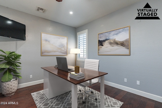 office with dark wood-type flooring