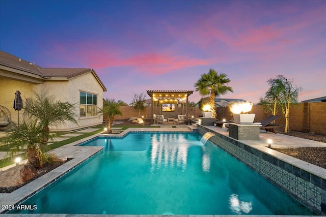 pool at dusk featuring a pergola, an outdoor hangout area, and a patio area