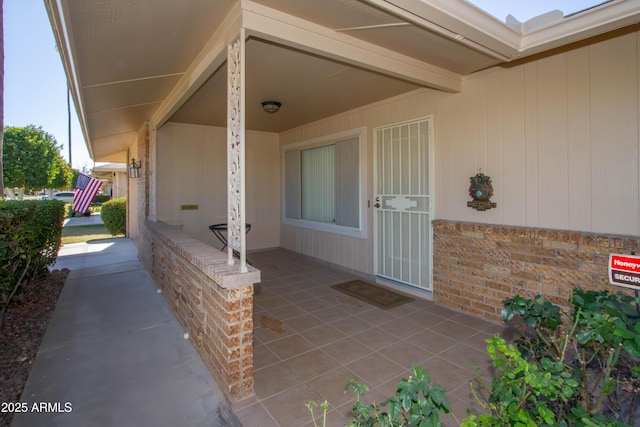 doorway to property featuring a patio