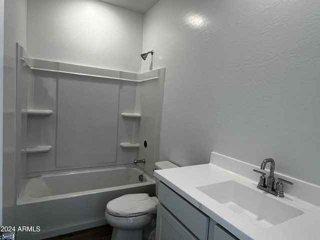 full bathroom featuring vanity, toilet, and shower / tub combination