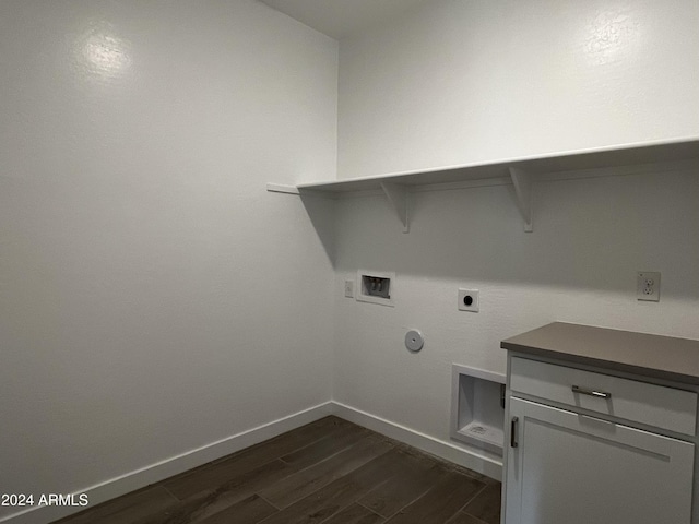 washroom featuring hookup for an electric dryer, washer hookup, dark hardwood / wood-style floors, and hookup for a gas dryer