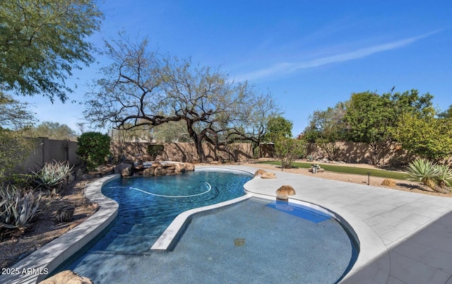 view of swimming pool featuring a fenced in pool and a fenced backyard