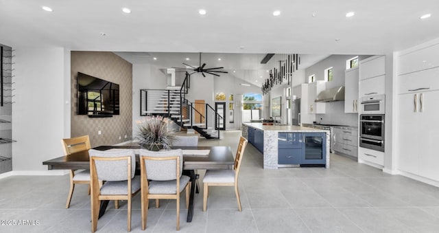 dining space with stairs, recessed lighting, baseboards, and light tile patterned floors