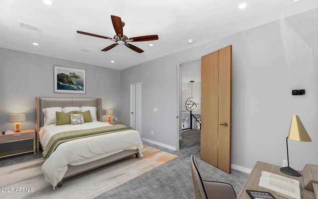 bedroom with recessed lighting, baseboards, visible vents, and light colored carpet