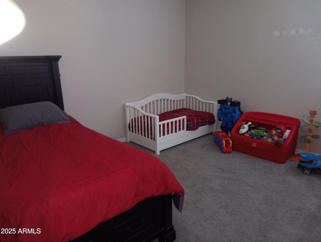 bedroom featuring carpet