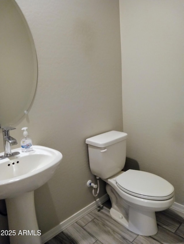 bathroom featuring toilet