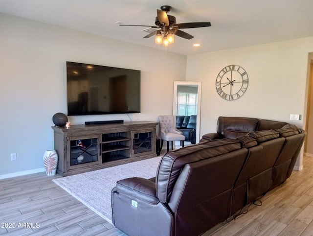 living room with ceiling fan