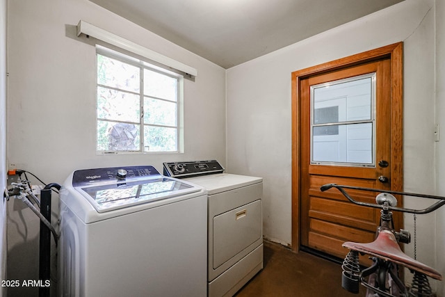 washroom with washing machine and dryer