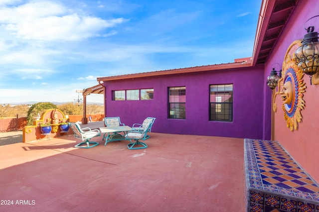 view of patio / terrace featuring a pergola