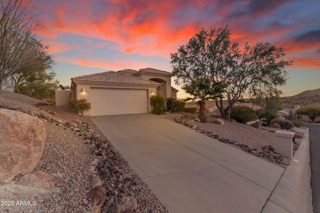 view of front of home featuring a garage