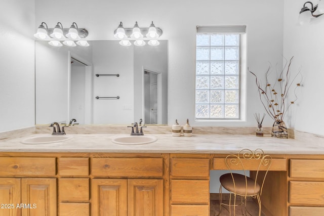 bathroom featuring vanity and a wealth of natural light