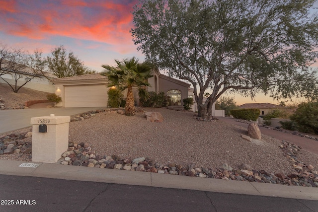 view of front of home with a garage