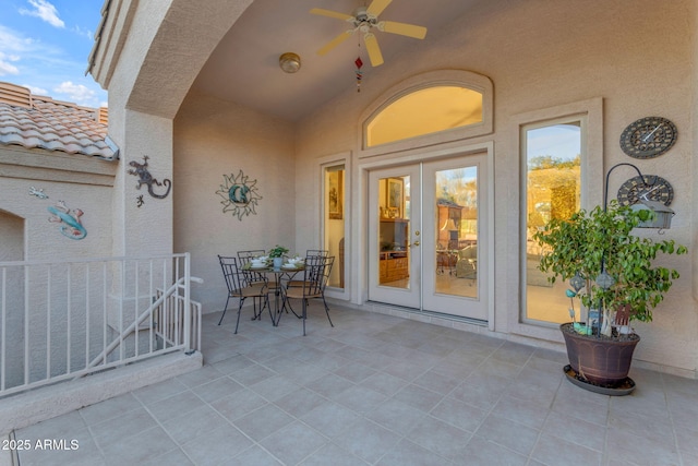 view of patio with ceiling fan and french doors