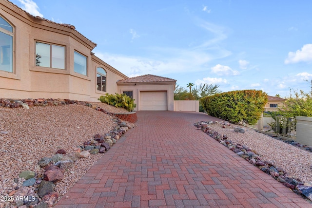 view of front of property featuring a garage