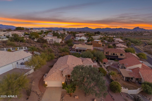 aerial view at dusk with a mountain view