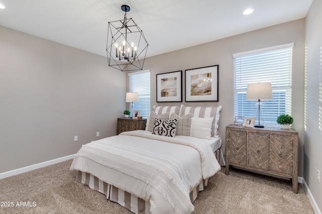 10619 W Bloch Rd, Tolleson, AZ 85353 - bedroom with carpet floors, a chandelier, and recessed lighting