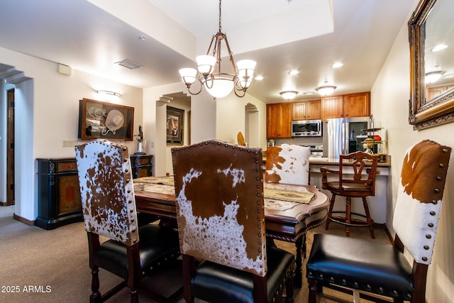 view of carpeted dining room