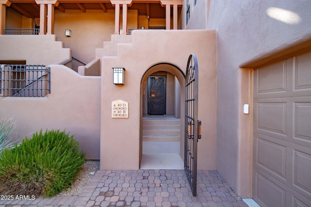 property entrance with a garage