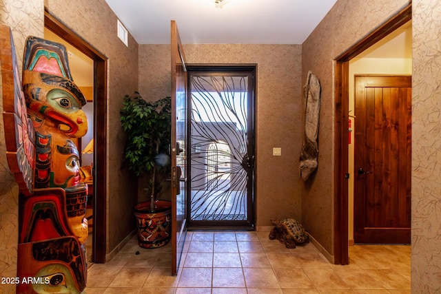 view of tiled entrance foyer