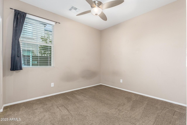 carpeted empty room with ceiling fan