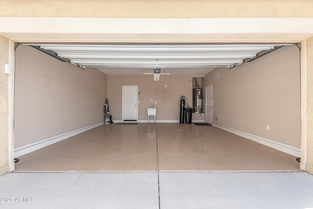 garage with sink and water heater